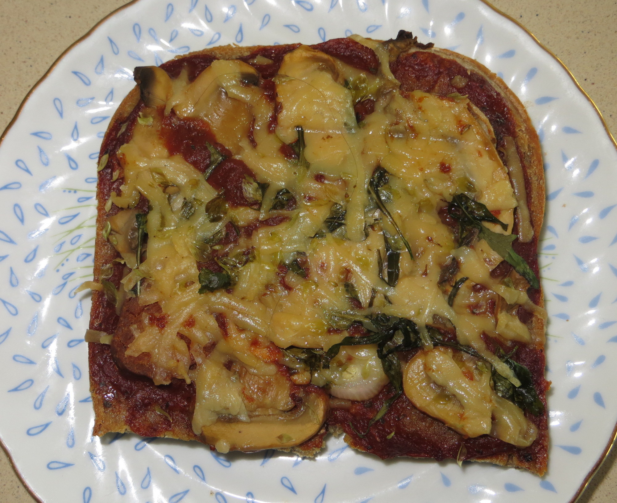 Mini Piza de p�o no prato